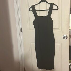 Lulu’s “Persuasian Black Ruffled Bodycon Midi Dress”
